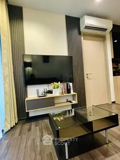 Modern living room with sleek TV setup and stylish decor
