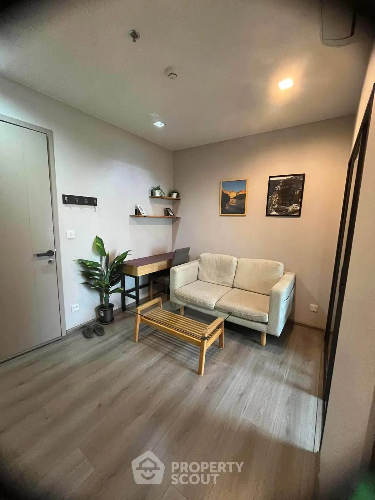 Cozy living room with modern decor and wooden flooring