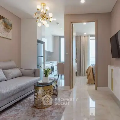 Modern living room with elegant decor and open kitchen layout