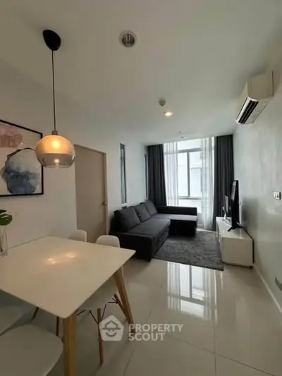 Modern living room with sleek furniture and natural light