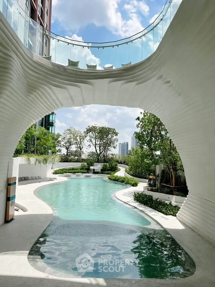 Luxurious modern pool area with unique architectural design and lush greenery, perfect for relaxation and leisure.