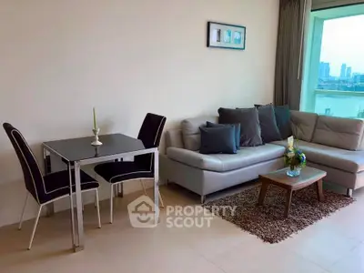 Modern living room with stylish furniture and city view, perfect for urban living.