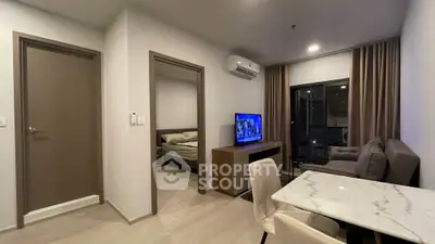 Modern apartment interior with cozy living room and bedroom view