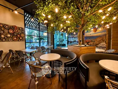 Chic cafe interior with stylish seating and vibrant decor, perfect for social gatherings.