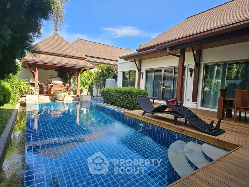 Luxurious villa with private pool and lush garden, perfect for relaxation and entertaining.