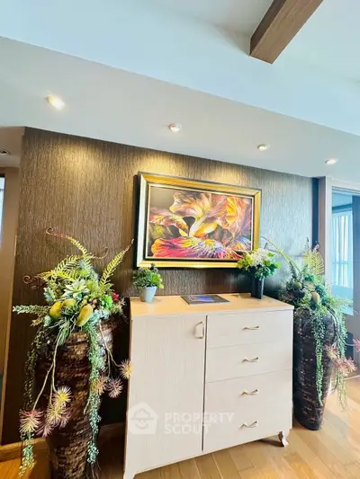 Elegant interior with stylish decor and vibrant artwork in a modern living space.