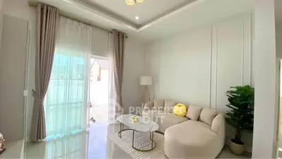 Bright and modern living room with elegant decor and natural light