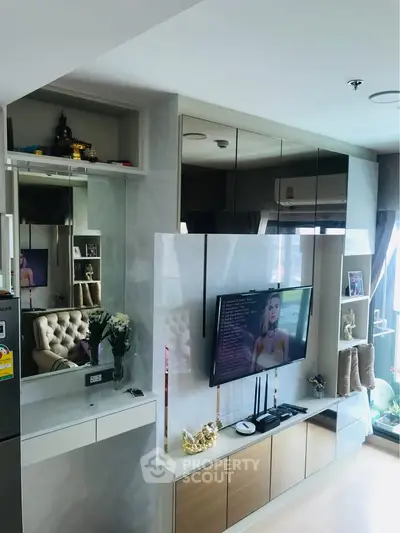 Modern living room with sleek entertainment center and stylish decor