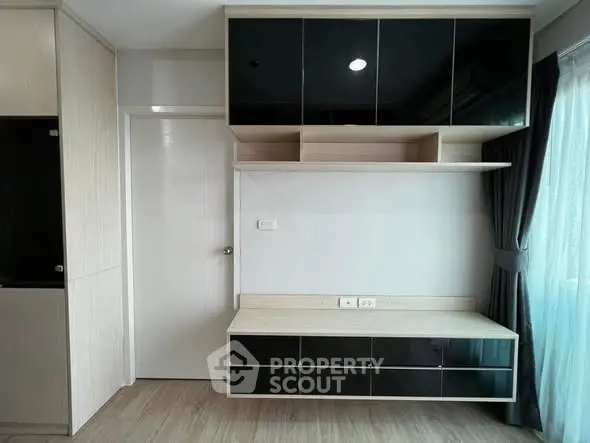 Modern interior with sleek built-in storage and natural light