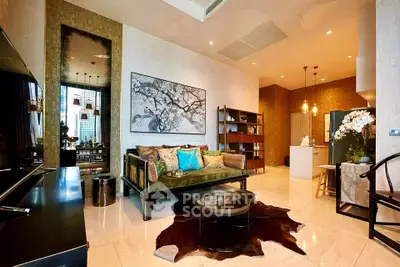 Luxurious living room with elegant decor and open layout, featuring modern furniture and stylish lighting.