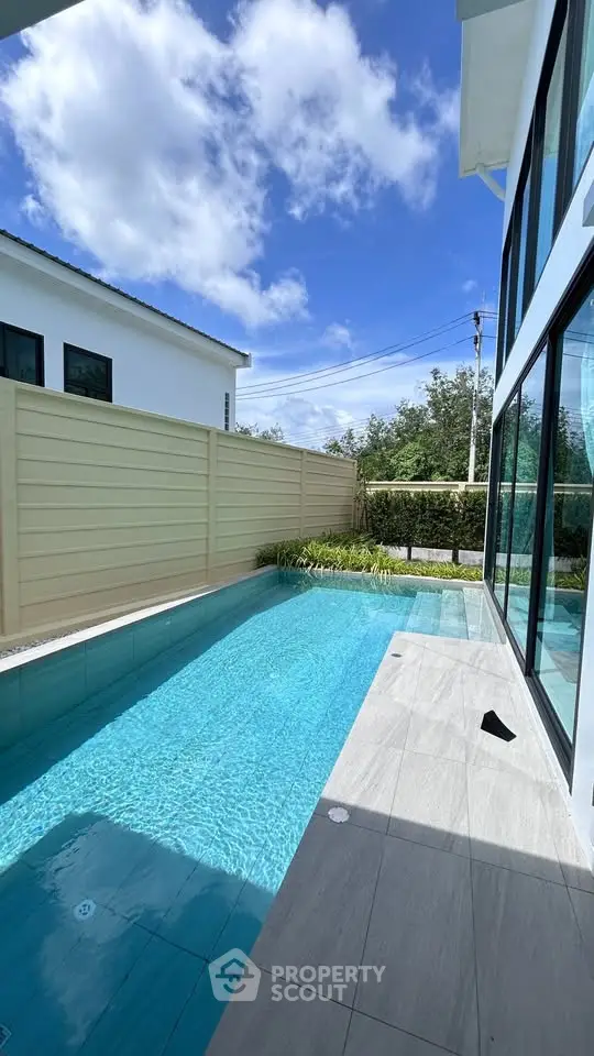 Luxurious private pool with modern design and serene outdoor setting, perfect for relaxation and entertainment.