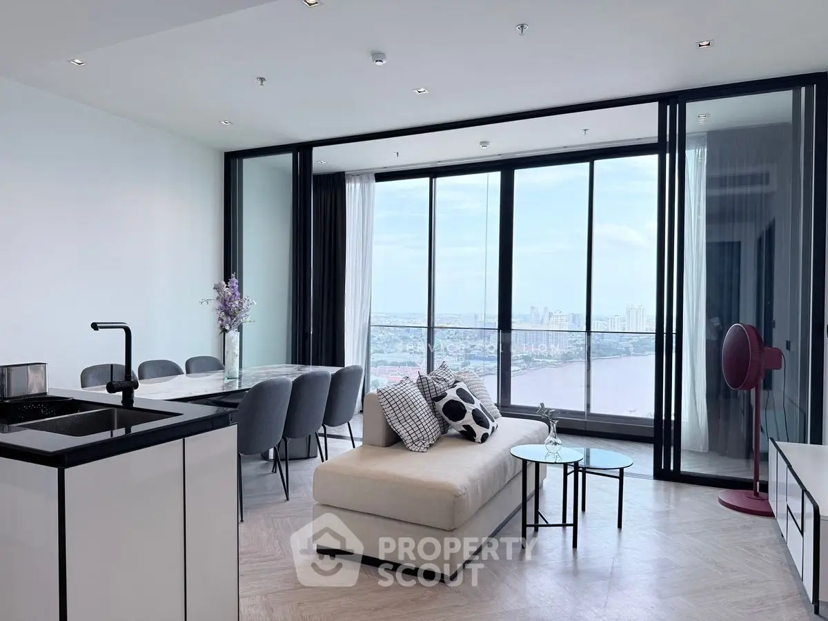 Luxurious modern living room with stunning river view and elegant decor