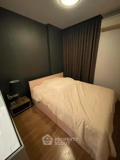 Cozy bedroom with modern decor and warm lighting