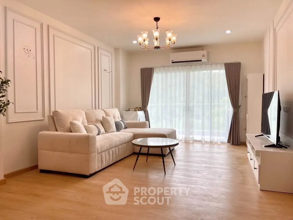 Spacious modern living room with elegant decor and natural light