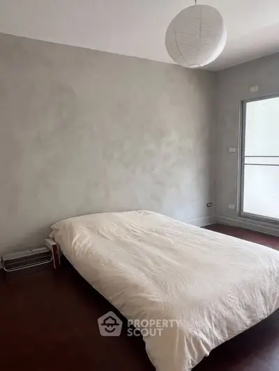 Minimalist bedroom with modern design and natural light