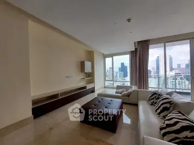 Luxurious living room with stunning city view and modern decor.