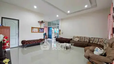 Spacious living room with modern furniture and elegant decor