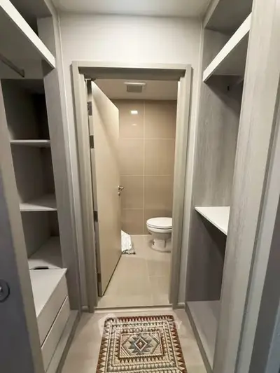 Modern bathroom with sleek design and built-in storage solutions