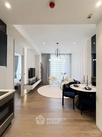 Modern open-plan living room with elegant dining area and stylish decor
