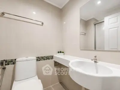 Modern bathroom with sleek fixtures and elegant tile design