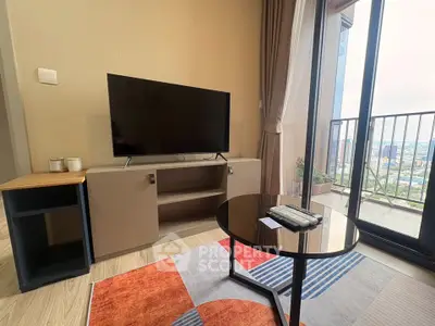 Modern living room with TV, stylish furniture, and balcony view in urban apartment