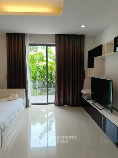 Modern living room with sleek design and garden view