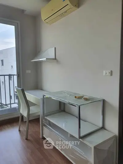 Modern study room with balcony view and air conditioning