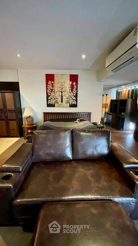 Luxurious living room with leather sofa and elegant decor