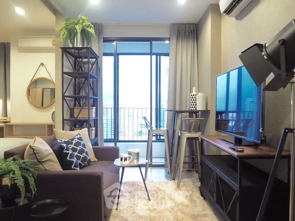 Modern living room with stylish decor and city view balcony