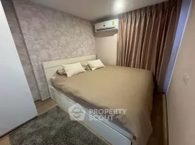 Cozy bedroom with elegant decor and air conditioning in modern apartment