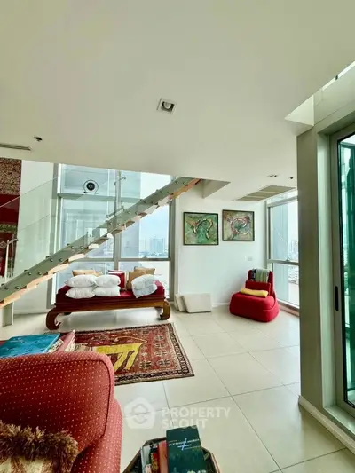 Luxurious modern living room with stunning city view and stylish decor