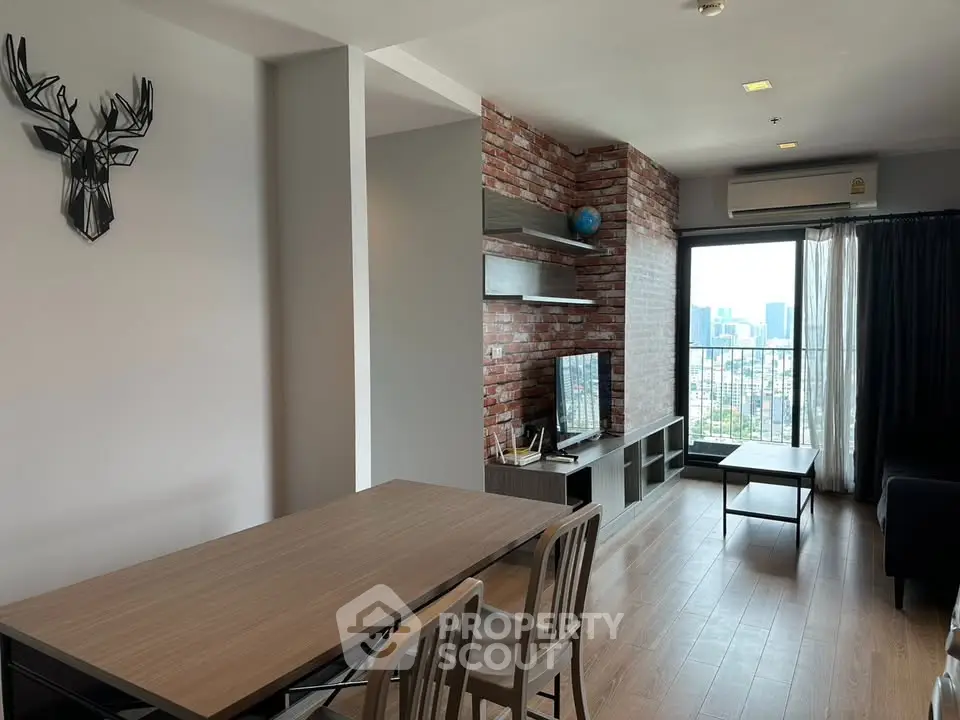 Modern living room with city view, stylish decor, and open layout