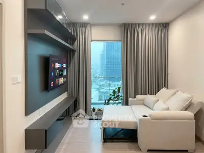 Modern living room with sleek entertainment setup and city view