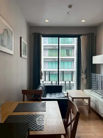 Modern living room with balcony view in urban apartment