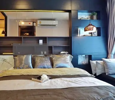 Luxurious bedroom with modern decor and stylish lighting