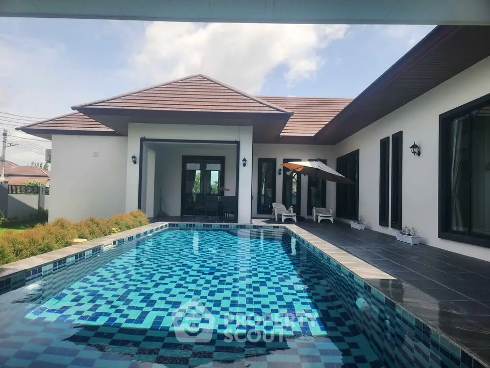 Luxurious modern villa with private pool and stylish exterior design, perfect for relaxation and entertainment.