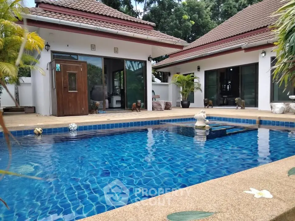 Luxurious villa with private pool and tropical garden, perfect for serene living.