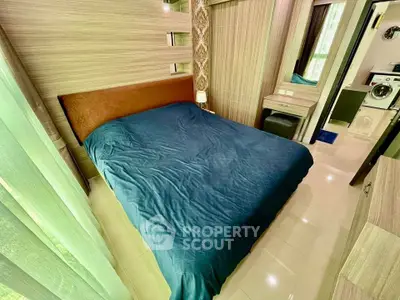 Modern bedroom with stylish decor and washing machine in compact space