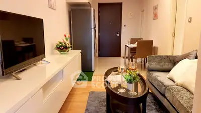 Cozy living room with modern decor and stylish furniture in a contemporary apartment.