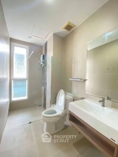 Modern bathroom with sleek fixtures and natural light