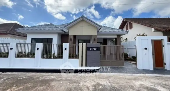 Charming single-story house with modern design and gated entrance in a serene neighborhood.