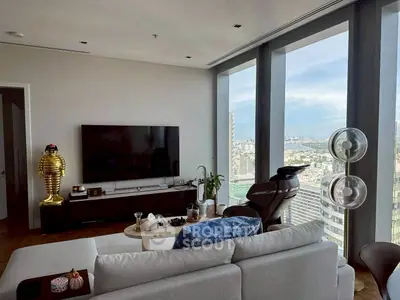 Luxurious living room with stunning city view and modern decor