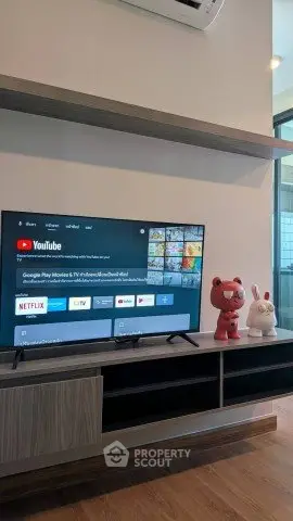 Modern living room with sleek TV setup and stylish decor