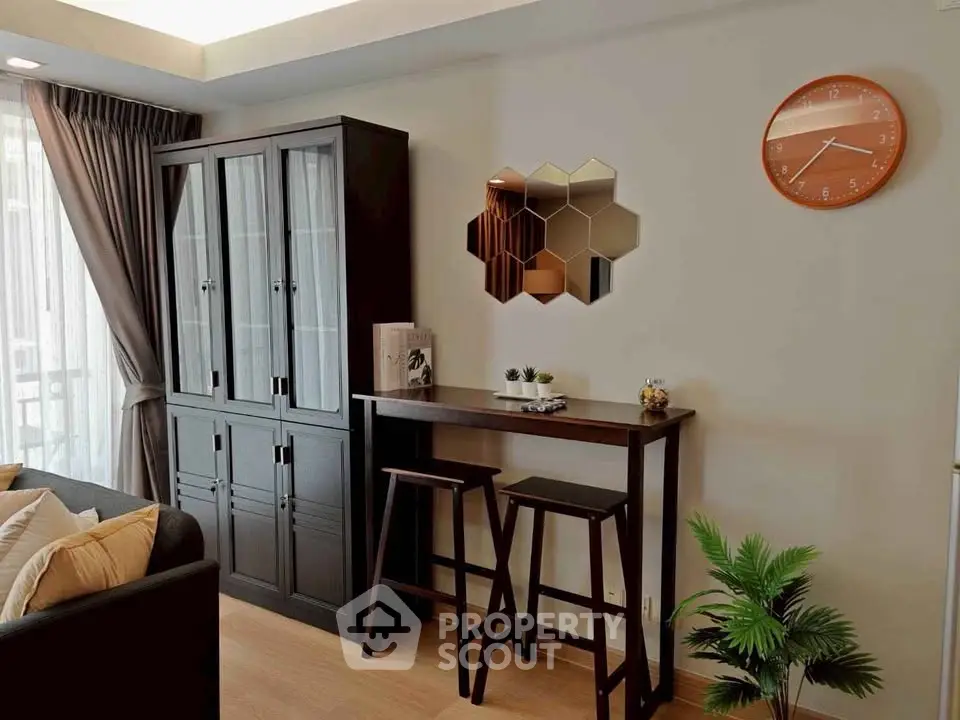 Stylish living room with modern furniture and unique wall decor