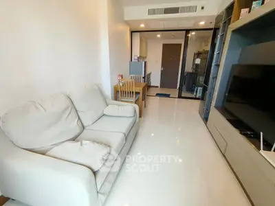 Modern living room with cozy sofa and sleek TV unit in a stylish apartment