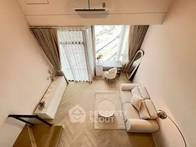 Luxurious modern living room with high ceilings and elegant decor, featuring a large window with a stunning view.
