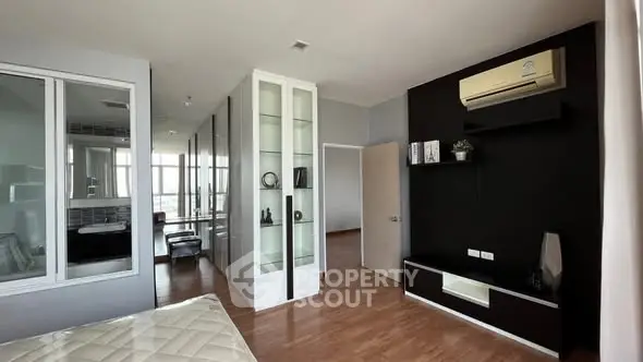 Modern bedroom with sleek design and air conditioning unit