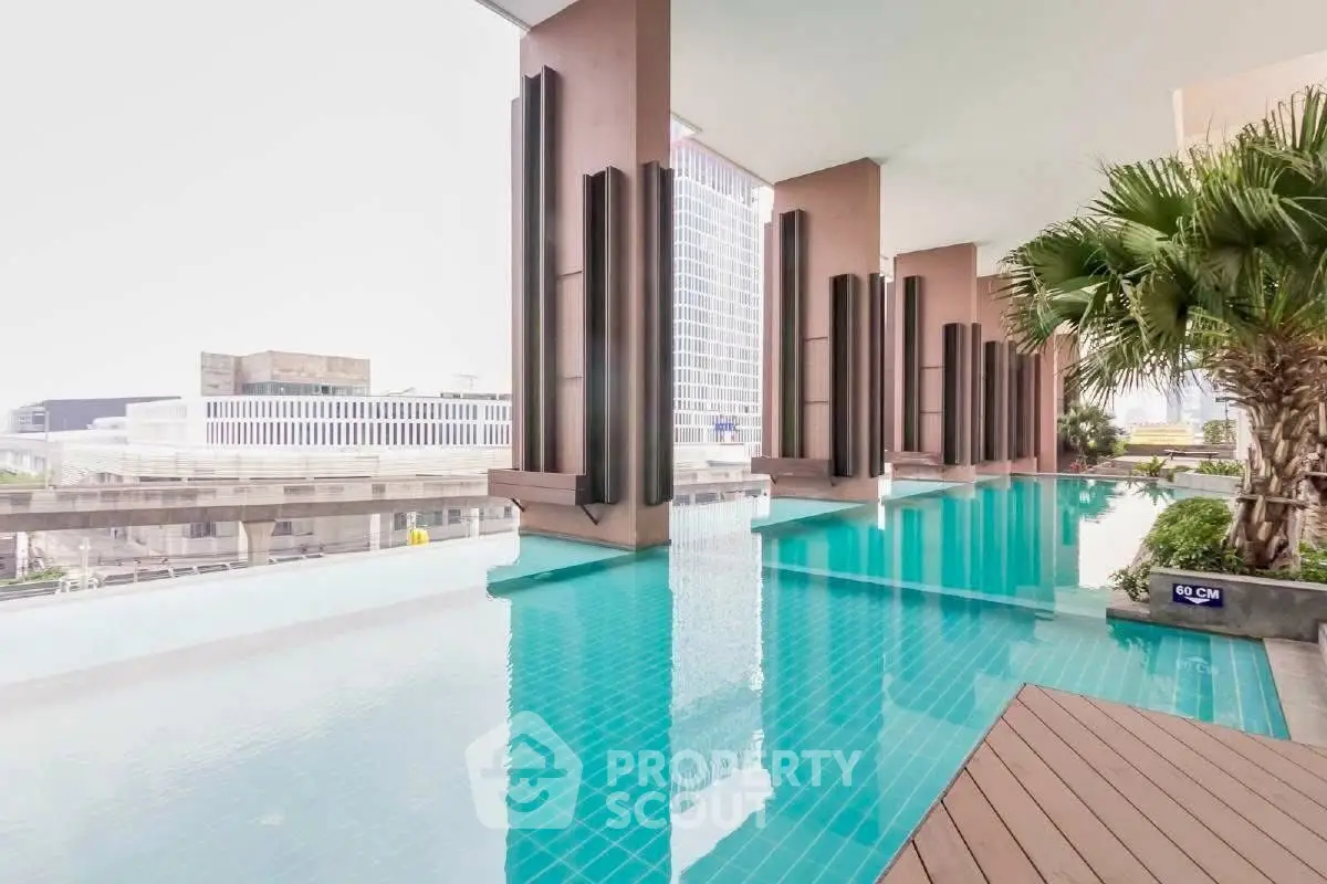 Luxurious rooftop infinity pool with stunning city views and modern architecture.