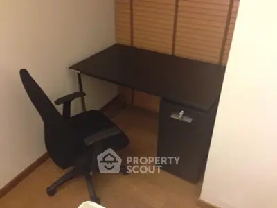 Cozy study nook with desk and chair in a modern apartment