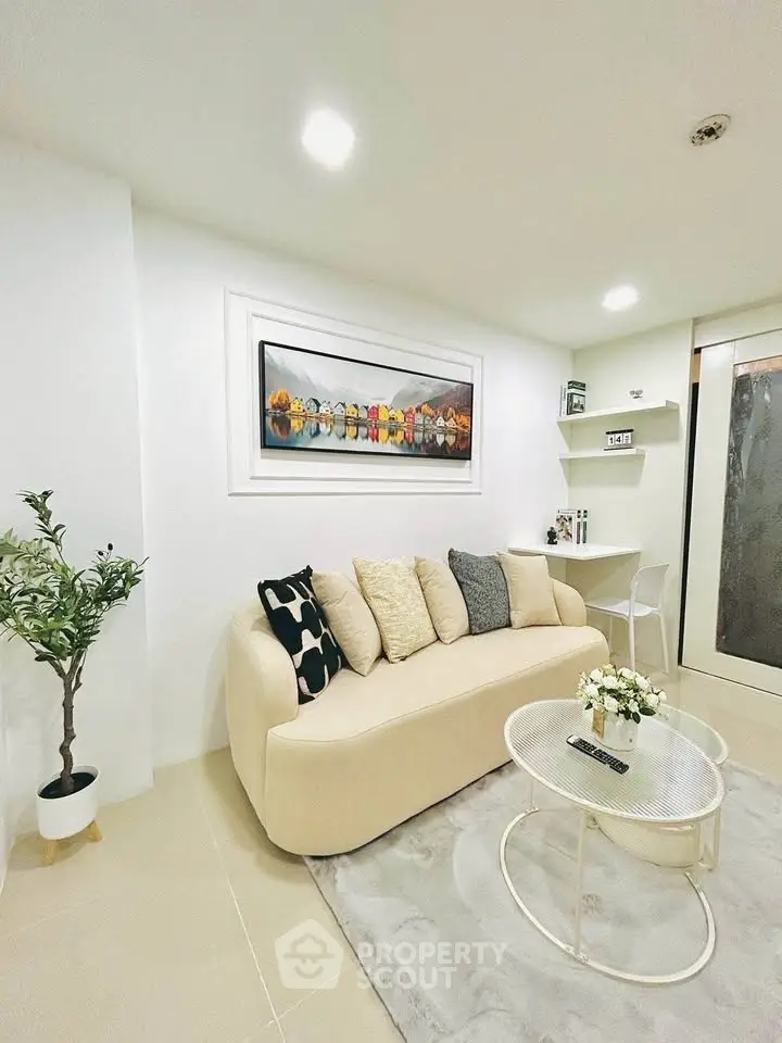 Chic modern living room with cozy sofa and stylish decor